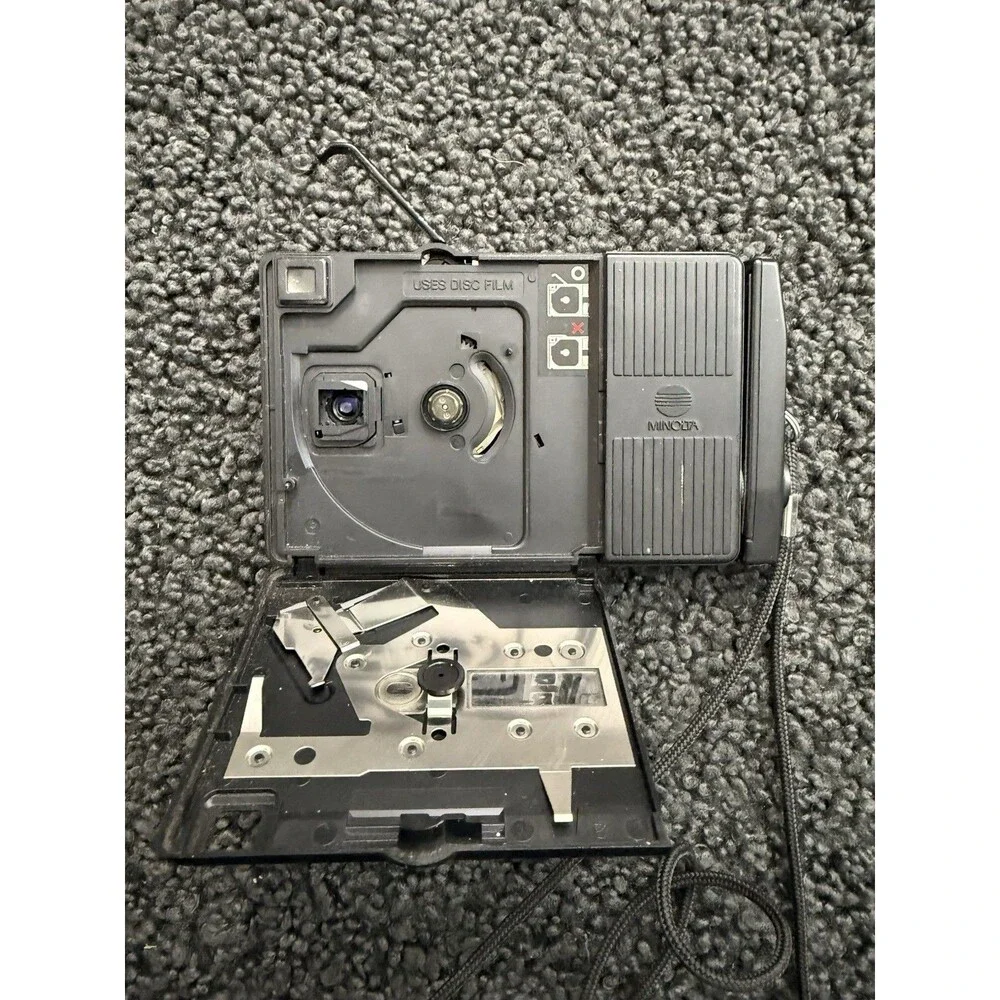 1983 Minolta Disc-7 Selfie Mirror Compact Disc Film Camera